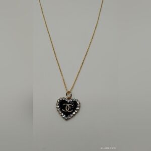 CHANEL Gold & Black Heart Pendant With Rhinestones On A Stainless Steel Necklace